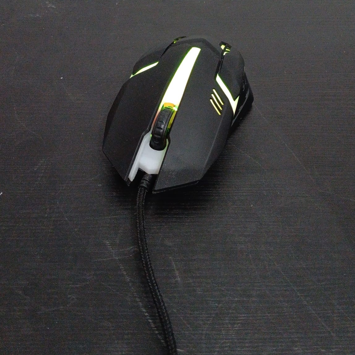 A wired gaming mouse designed for repetitive clicking and scrolling interactions.