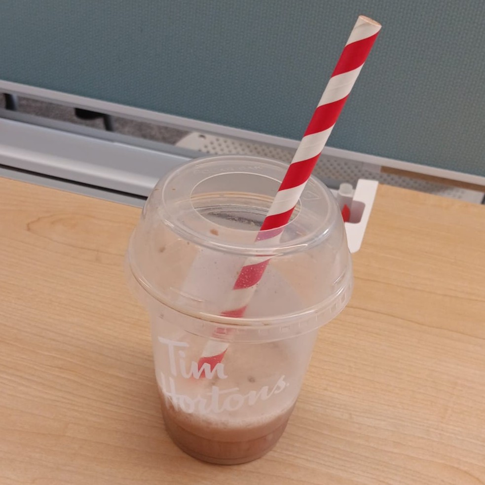 Tim Hortons Ice Capp (Taking a Sip):
The straw made a hollow suction sound as the drink moved upward.