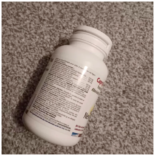 Another one of my medicine bottles, but it's plain white and the shape is a bit rounder.